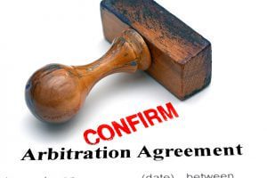An Arbitration Agreement Document that has just been confirmed with a stamp.