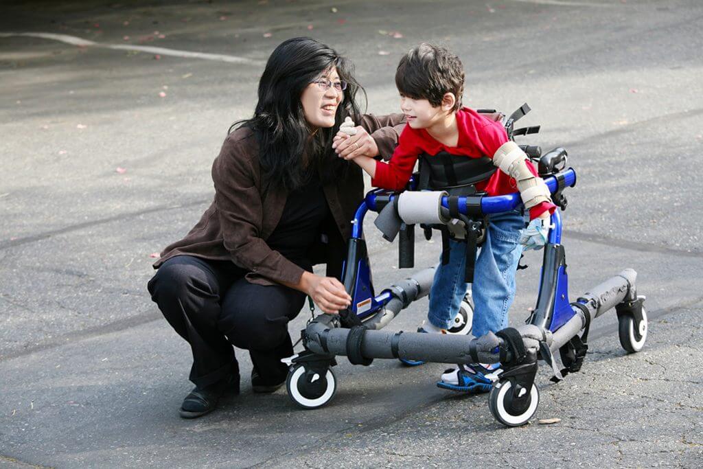 Mother with special needs son in wheelchair